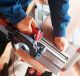 Click For Bigger Image: Fastening the portable circular saw to the KSS rail creates a very practical single-handed cross-cutting system.